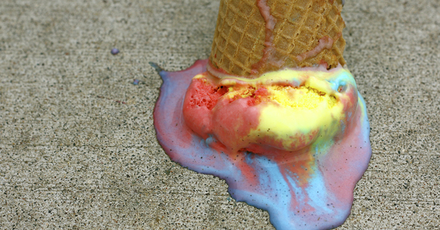 melting ice cream cone on the ground