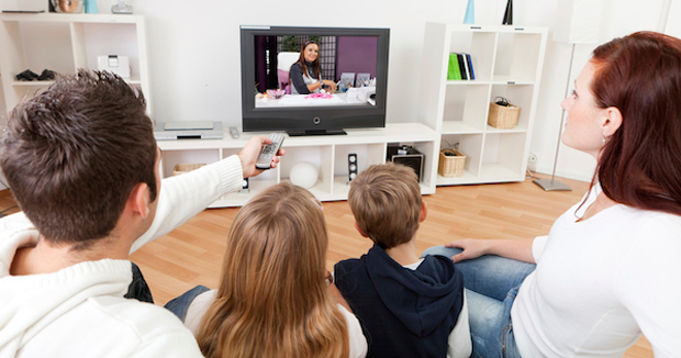 Family watching TV
